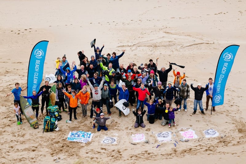 People taking part in a beach clean