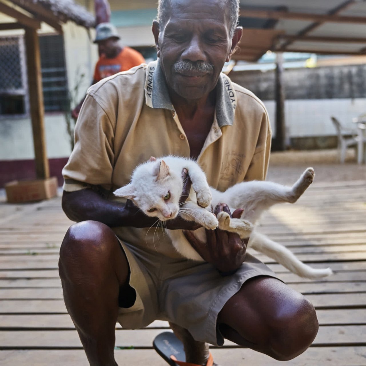 mr_lamarsdel_lolo_and_one_of_his_cats_on_ambae_island_in_vanuatu