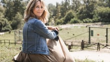 Anne Louise Hassing skuer ud over bjørnereservatet Libearty. Foto: Trine Sand Skjøldberg