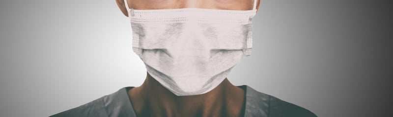 A person wearing a face mask. Credit: Shutterstock